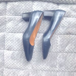 Slightly used Ralph Lauren navy blue pumps. My foot is a wide C. Very classy